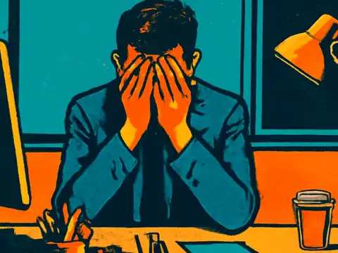 Pop-art illustration of a person at an office desk with both hands covering their face, a monitor and desk lamp beside them.