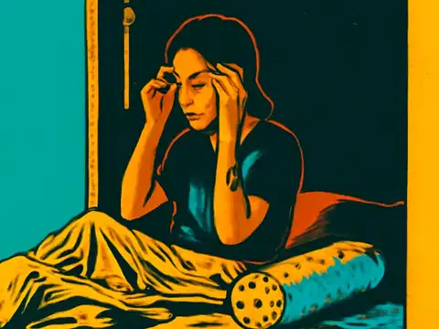 A woman sits up on a bed in a dark room with both hands pressed to her temples and her eyes closed, a rumpled yellow sheet across her lap, rendered as a flat teal, yellow and orange illustration.