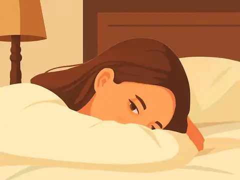 Flat vector illustration of a person with long brown hair lying on a bed with their head resting on their arm and their eyes open, a lamp on a bedside table behind them, in cream, orange and brown.
