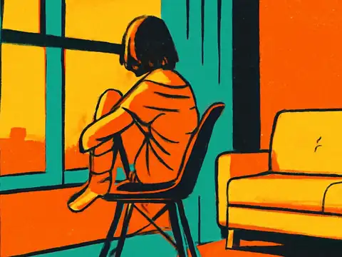Pop-art illustration of a woman sitting alone on a chair by a window, knees drawn up, looking out at a city skyline, in orange and teal.