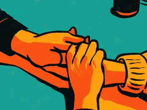 Two pairs of hands clasped together across a table, one person holding the other person’s hand in both of theirs, rendered as a flat orange, yellow and teal illustration.